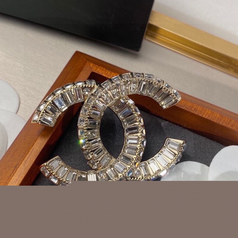 Ch*el brooches